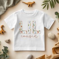 Lil Cousin Girls T-Shirt Dinosaur Rainbow Patterned Boxes Script Lettering for Toddler Announcement Gift