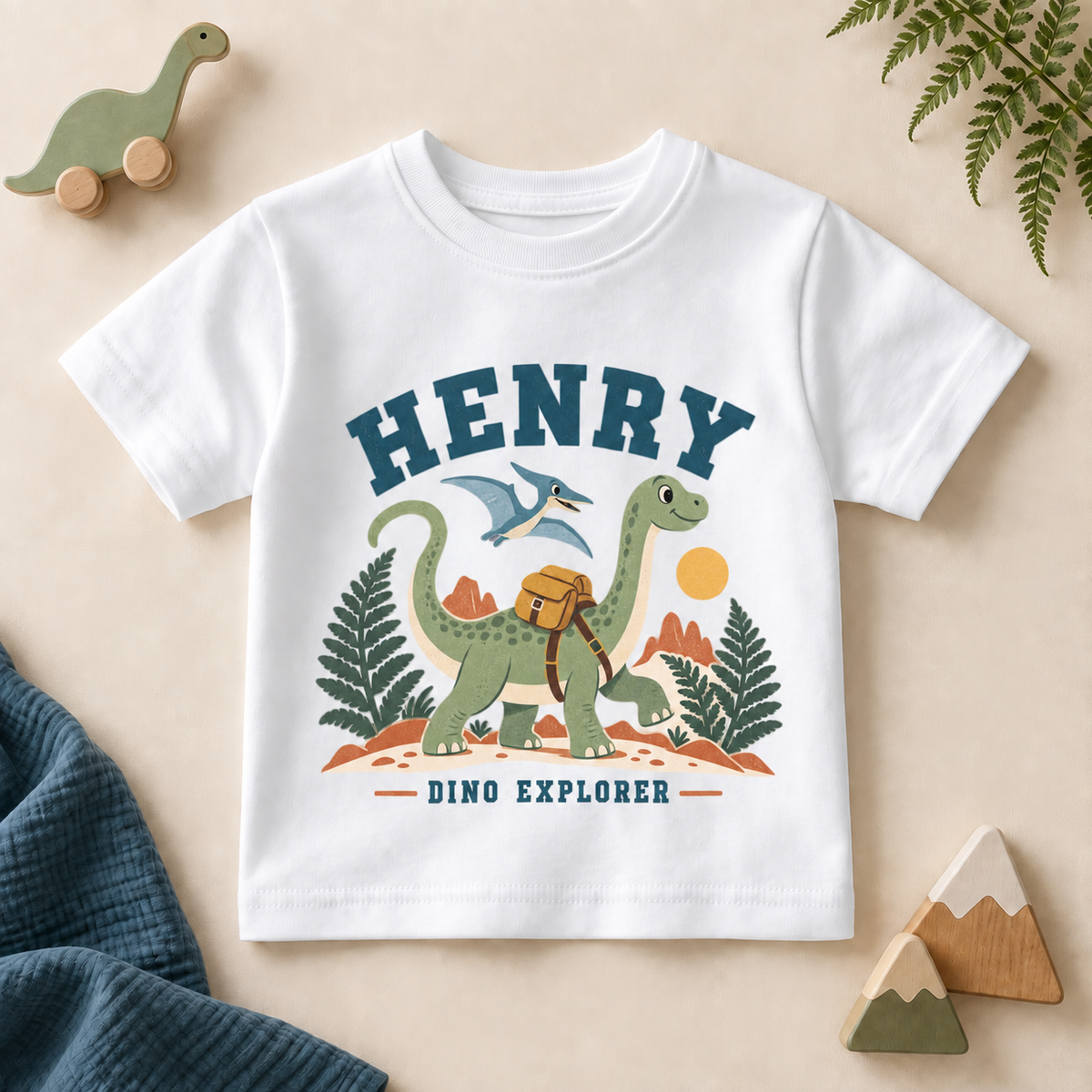 Personalised Dinosaur Explorer T-Shirt for Kids; personalised name shown as an example.