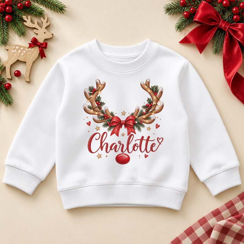 Personalised Name Girls Jumper Christmas Reindeer Antlers Red Bow Nose Script Lettering for Kids Christmas Gift. Example name shown.