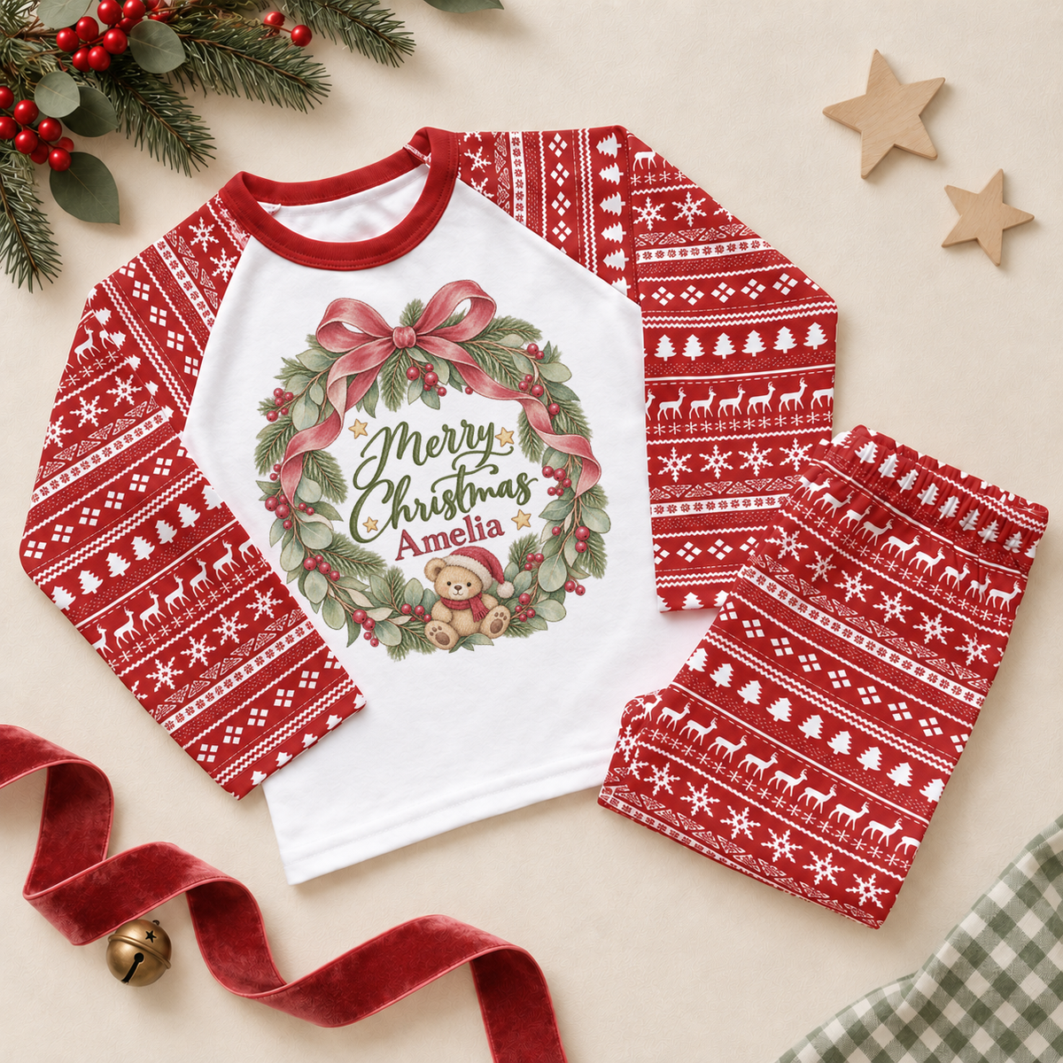 Personalised Name Kids Pyjamas Christmas Wreath Red Bow Holly Berries Pine Leaves Script Christmas Gift. Example name shown.