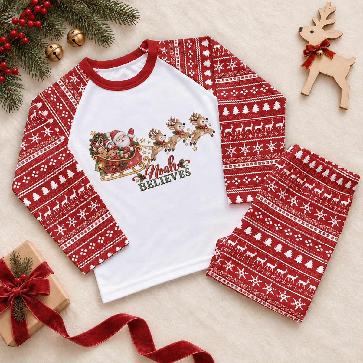 Personalised Name Kids Pyjamas Christmas Santa Sleigh Reindeer Fair Isle Snowflake Believes. Example name shown.
