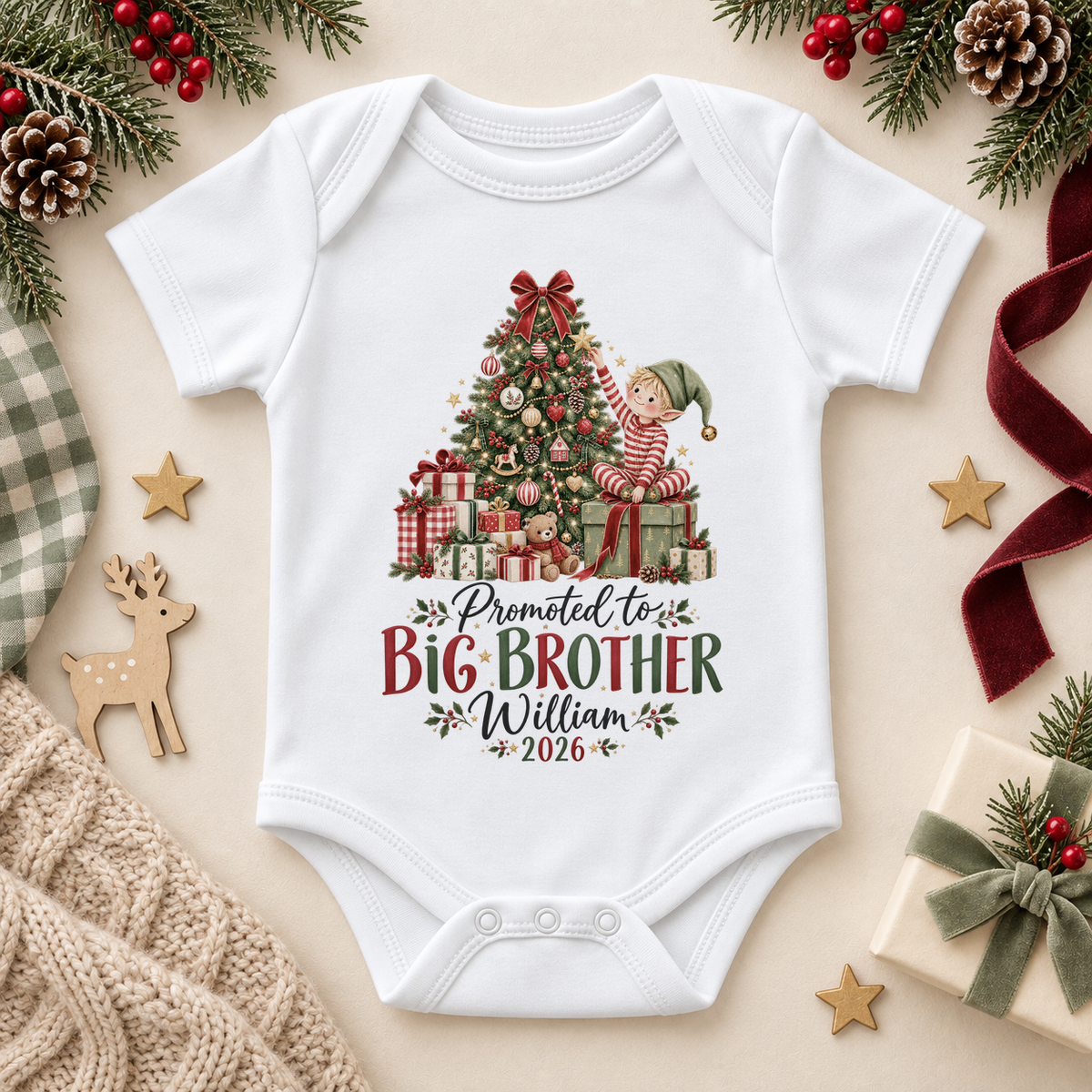 White baby bodysuit. The print features an elf decorating a Christmas tree above a Big Brother announcement.
