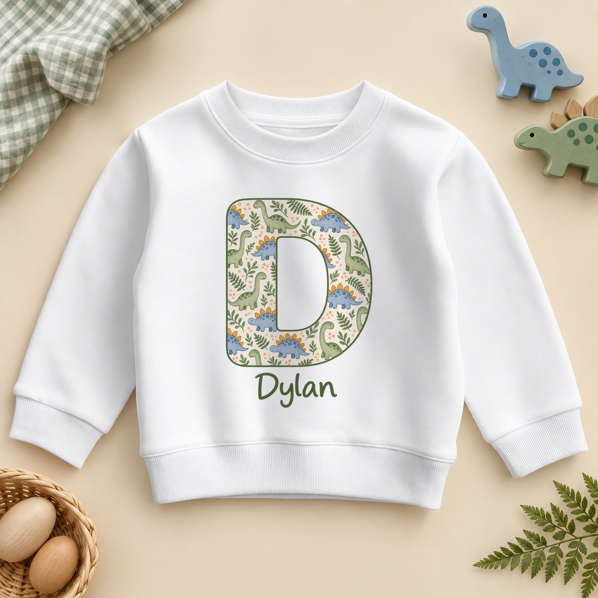 Personalised Dinosaur Initial Sweatshirt for Kids; example name shown.