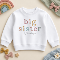 Personalised Big Sister white sweatshirt, pastel outlined serif letters with Penelope example name, styled with pastel rainbow and bows.
