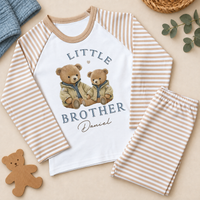 Personalised Little Brother beige striped cotton pyjama set with two teddy bears in tan jackets and the example name Daniel.