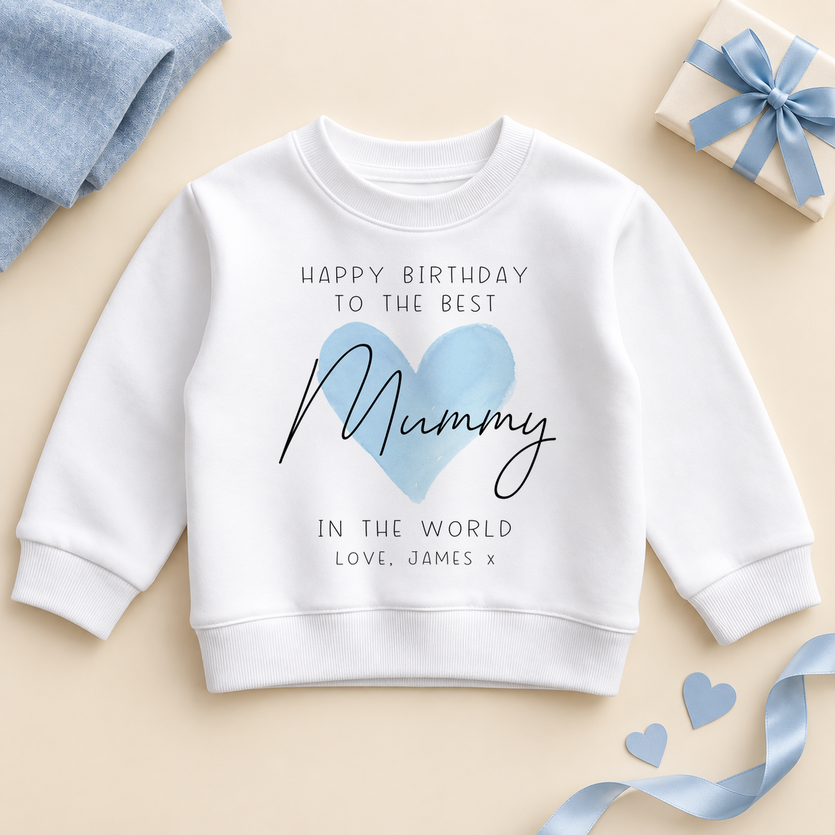 White child sweatshirt with Happy Birthday to the Best Mummy in the World, a blue watercolour heart and Love, James x sign-off.