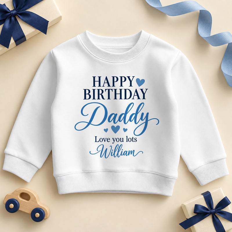 White kids sweatshirt printed Happy Birthday in navy capitals with a blue heart, Daddy in blue script, Love you lots and the example name William.