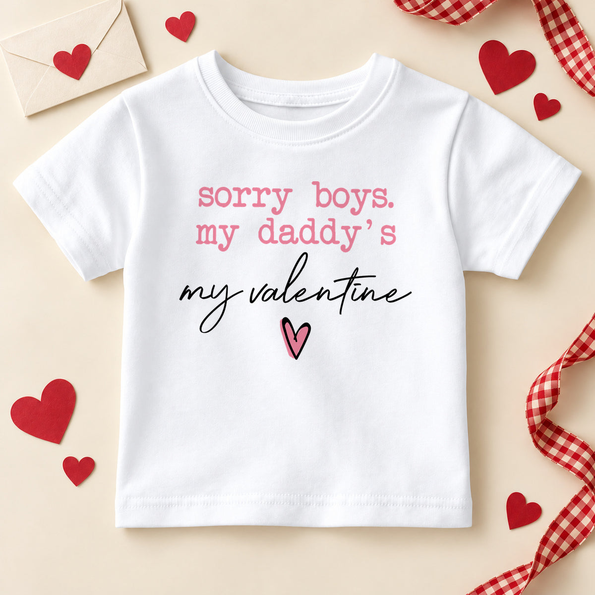 Sorry boys my daddy's my valentine kids T-shirt: a white tee with pink typewriter lettering, black script and a small pink heart